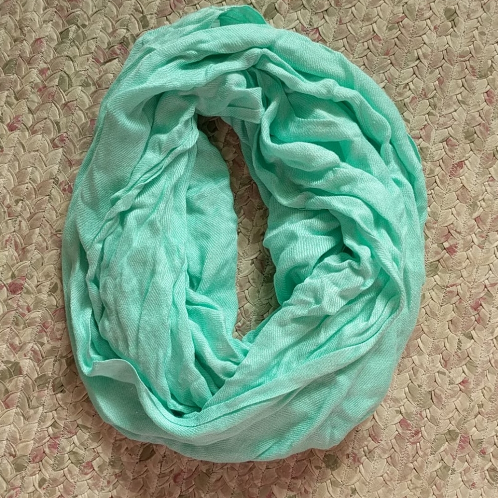 Infinity scarf is mint green
